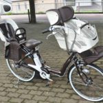 Bicicleta com três assentos